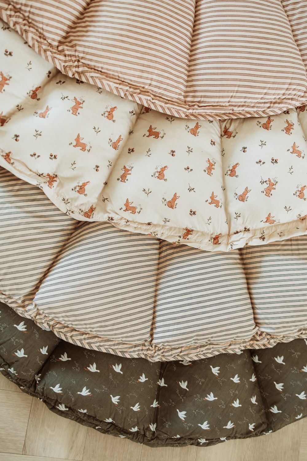 detail of 4 new designs of bloom babymat