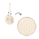 detail of soft organic rabbit babymat, from bag to mat