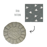 detail of bloom birds babymat, bird pattern