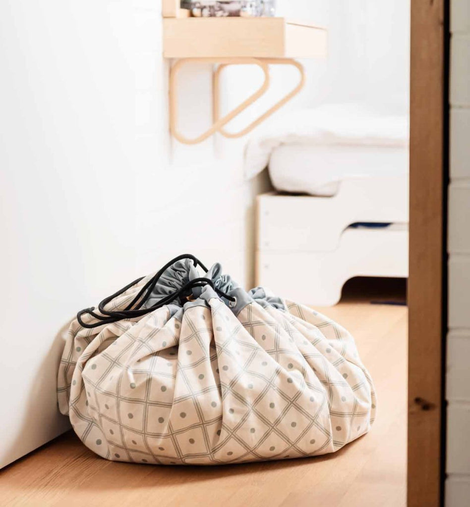 beige colour cube patterned closed storage bag 