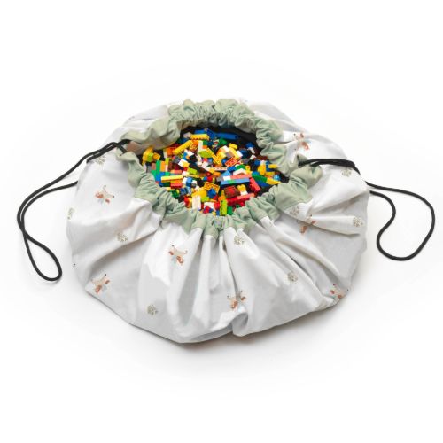 fairyworld toy storage bag and playmat, closed bag filled with lego