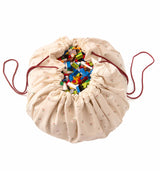 detail picture of cherry cherry toy storage bag, filled with lego