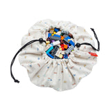 Mini cars toy storage bag, closed and filled with toys